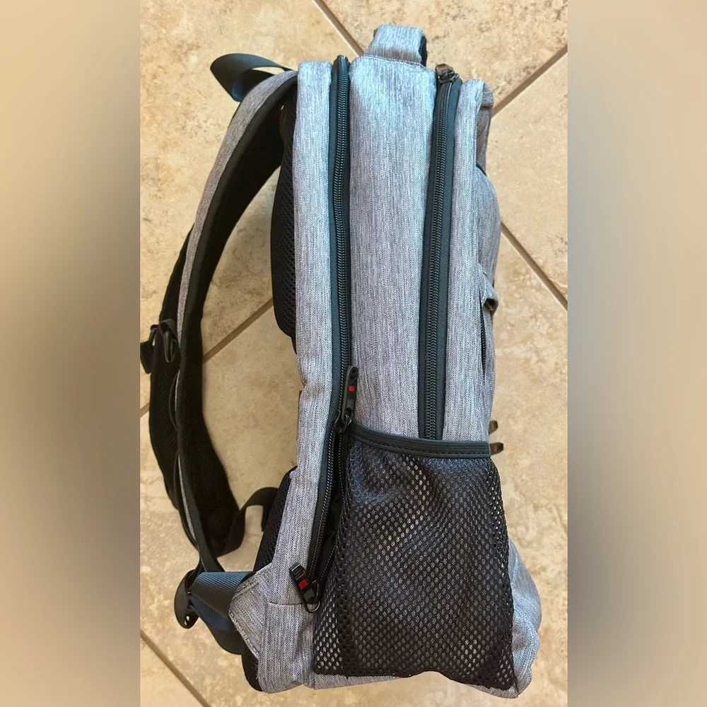 Backpack Excellent condition! Lots of zip compartments. Grey black. Clean!